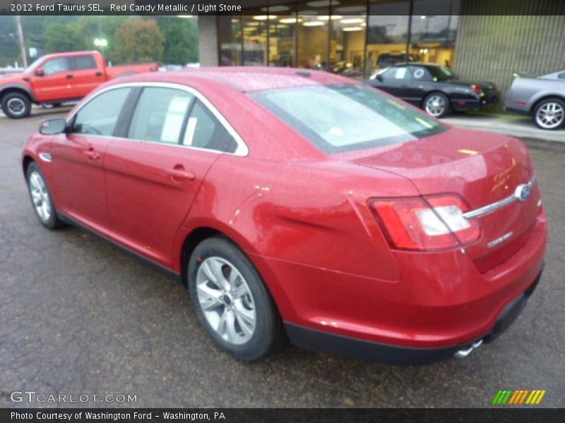 Red Candy Metallic / Light Stone 2012 Ford Taurus SEL