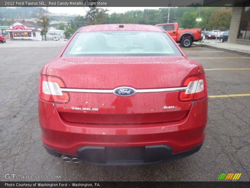 Red Candy Metallic / Light Stone 2012 Ford Taurus SEL