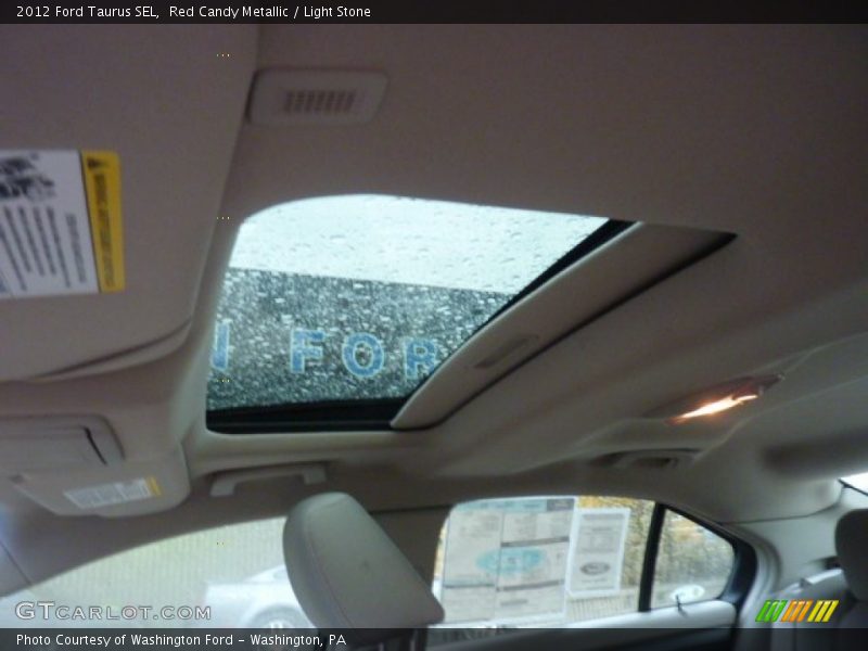 Red Candy Metallic / Light Stone 2012 Ford Taurus SEL