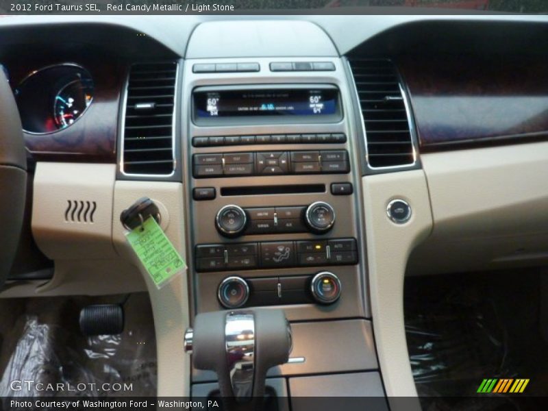Red Candy Metallic / Light Stone 2012 Ford Taurus SEL