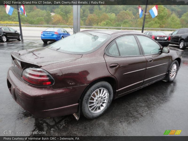 Dark Cherry Red Metallic / Ruby Red 2002 Pontiac Grand Prix GT Sedan