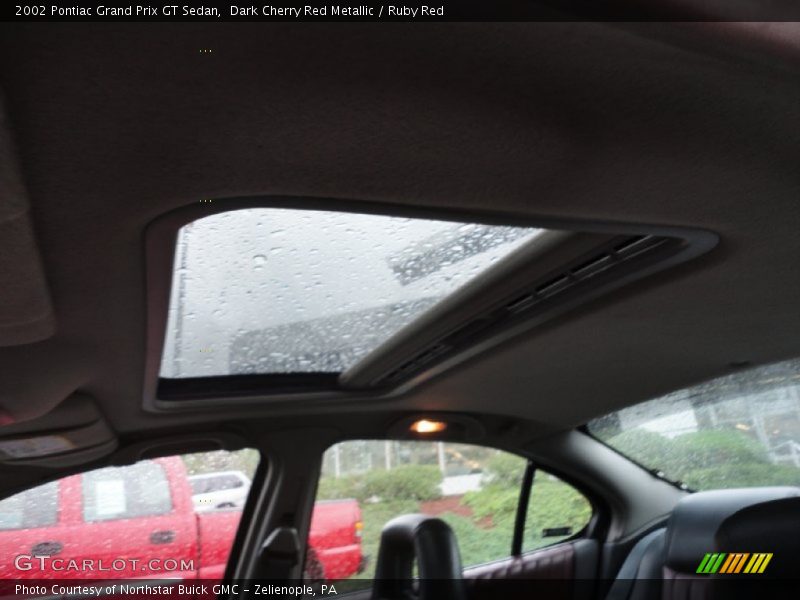 Dark Cherry Red Metallic / Ruby Red 2002 Pontiac Grand Prix GT Sedan