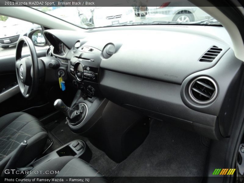 Dashboard of 2011 MAZDA2 Sport