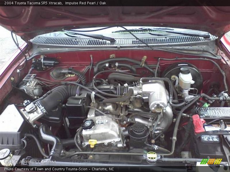 Impulse Red Pearl / Oak 2004 Toyota Tacoma SR5 Xtracab