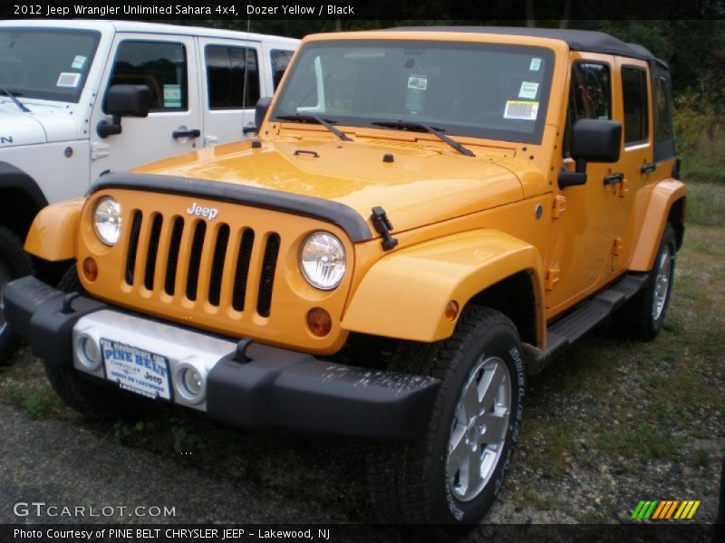 Dozer Yellow / Black 2012 Jeep Wrangler Unlimited Sahara 4x4