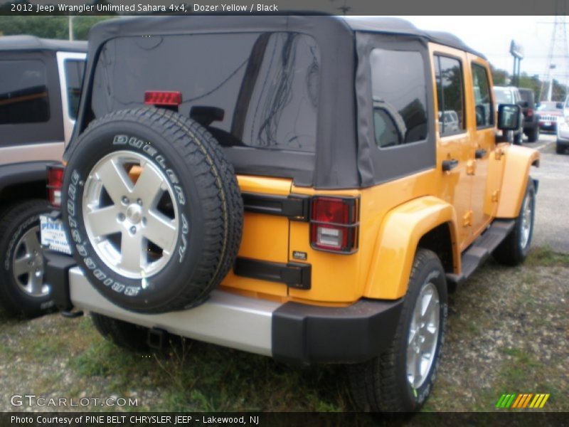 Dozer Yellow / Black 2012 Jeep Wrangler Unlimited Sahara 4x4