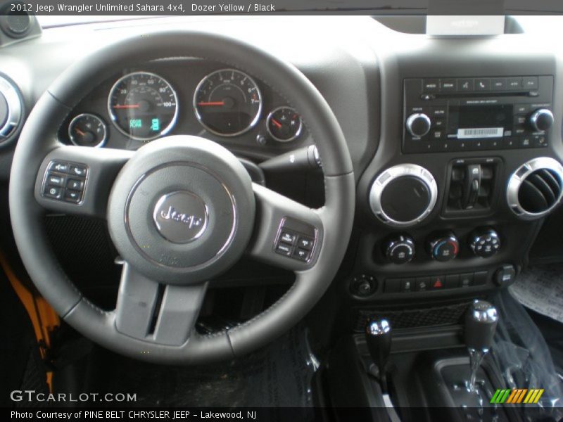 Dozer Yellow / Black 2012 Jeep Wrangler Unlimited Sahara 4x4