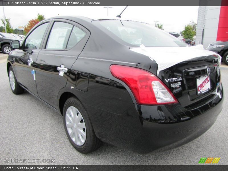 Super Black / Charcoal 2012 Nissan Versa 1.6 SV Sedan