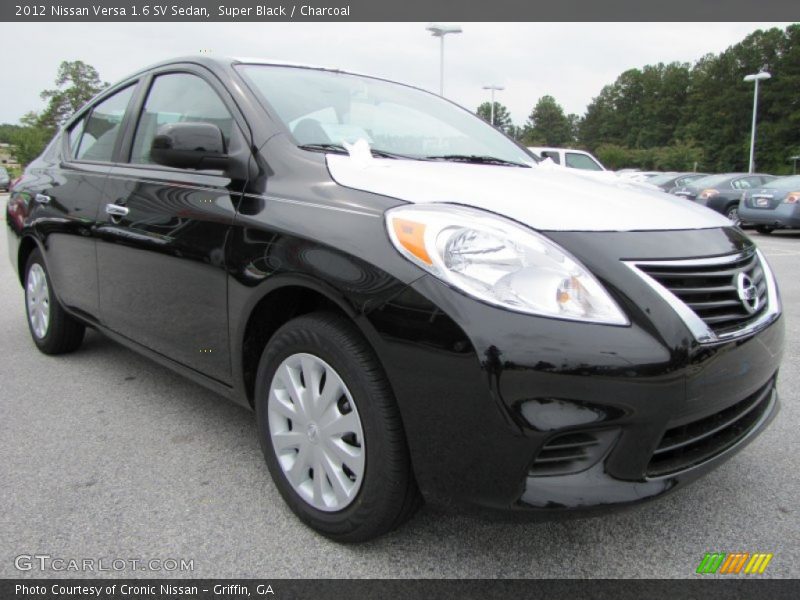 Super Black / Charcoal 2012 Nissan Versa 1.6 SV Sedan