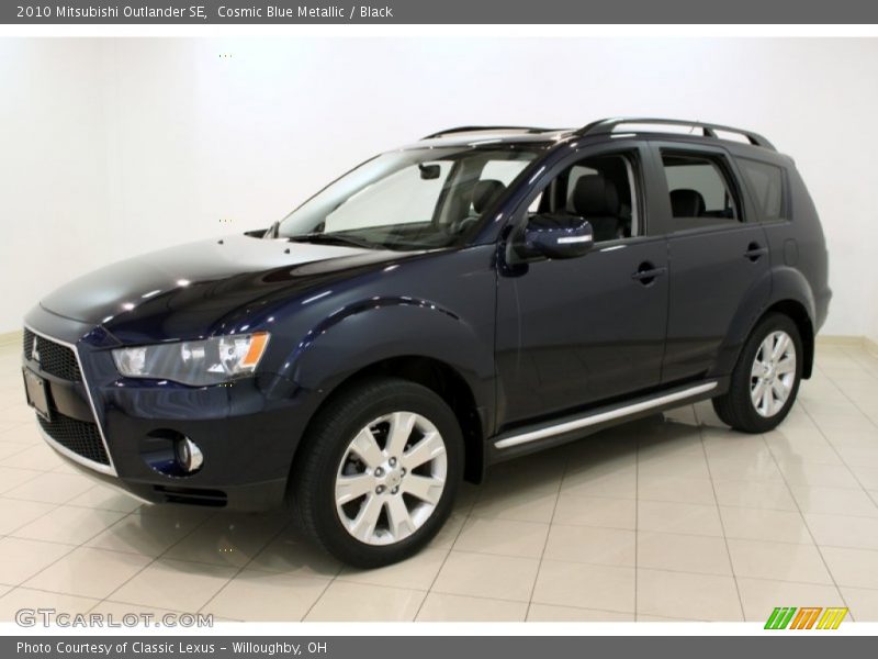 Cosmic Blue Metallic / Black 2010 Mitsubishi Outlander SE