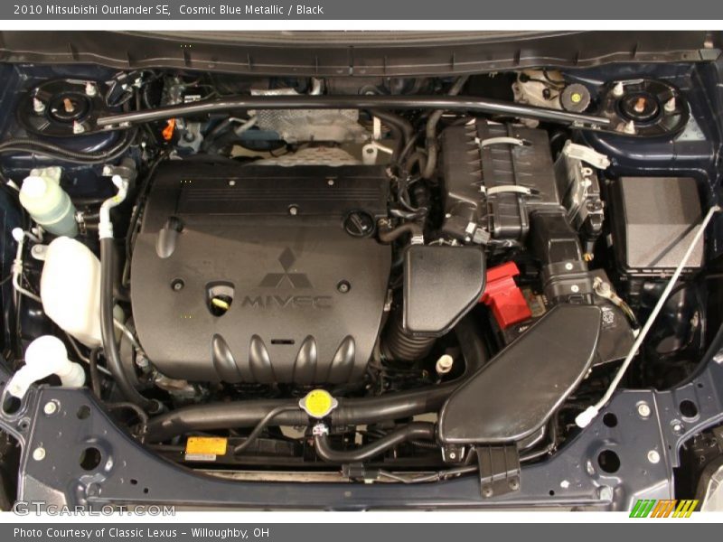 Cosmic Blue Metallic / Black 2010 Mitsubishi Outlander SE