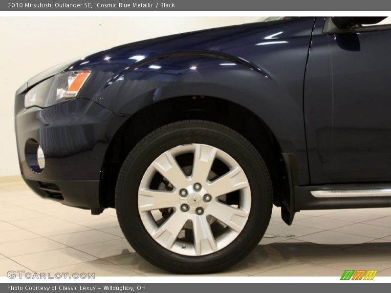 Cosmic Blue Metallic / Black 2010 Mitsubishi Outlander SE