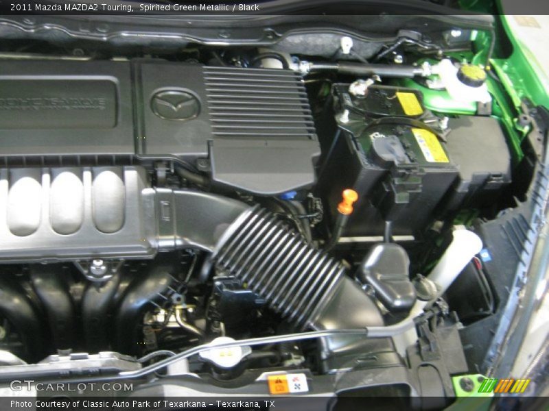 Spirited Green Metallic / Black 2011 Mazda MAZDA2 Touring