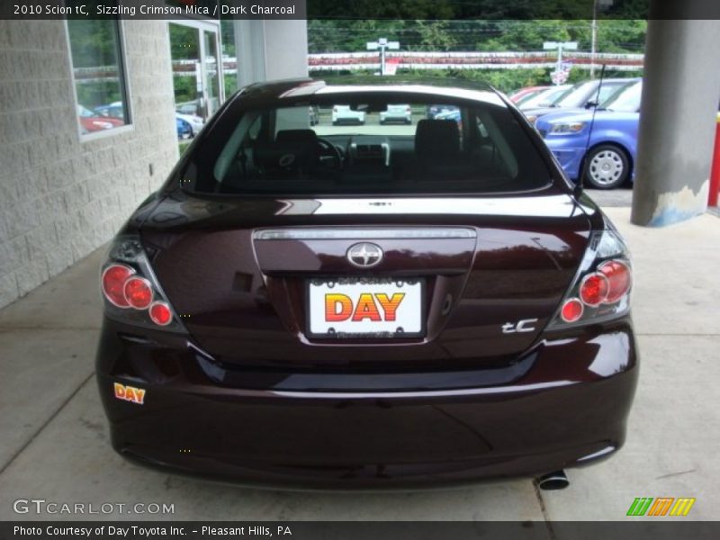 Sizzling Crimson Mica / Dark Charcoal 2010 Scion tC