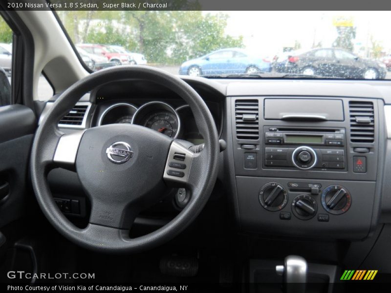 Super Black / Charcoal 2010 Nissan Versa 1.8 S Sedan