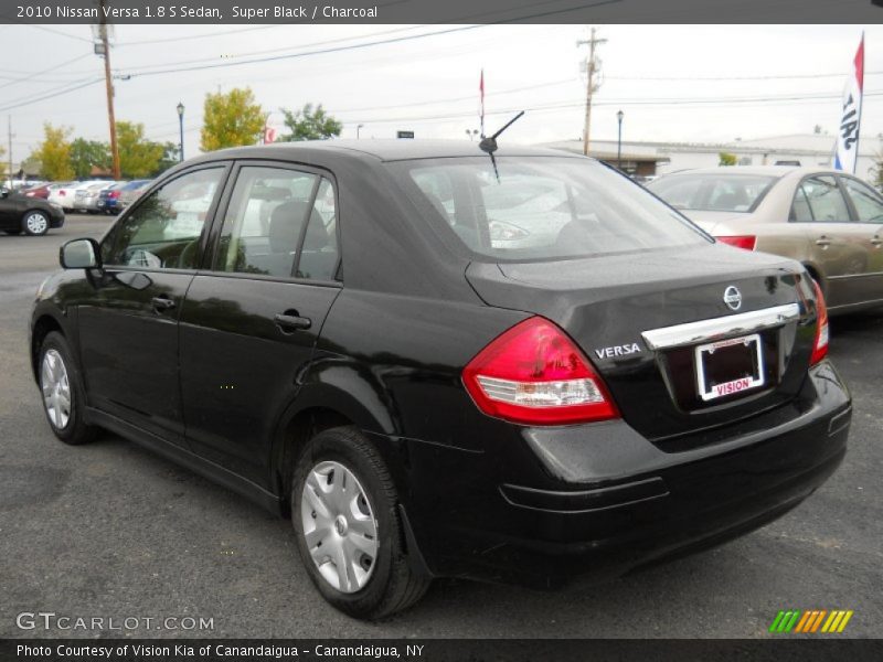 Super Black / Charcoal 2010 Nissan Versa 1.8 S Sedan