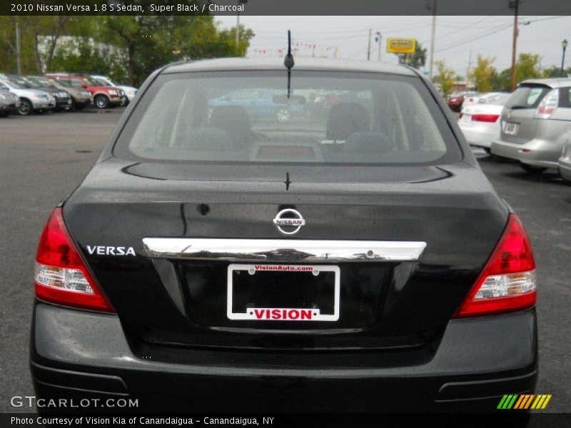 Super Black / Charcoal 2010 Nissan Versa 1.8 S Sedan