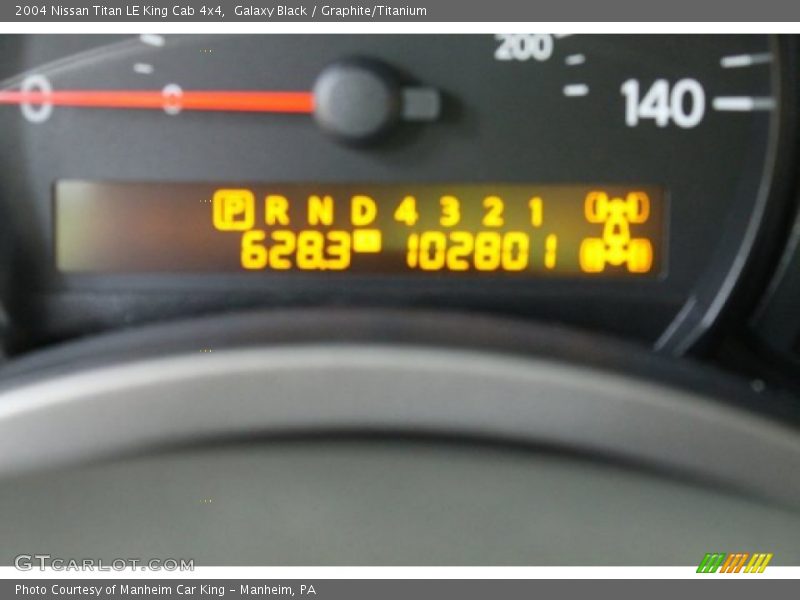 Galaxy Black / Graphite/Titanium 2004 Nissan Titan LE King Cab 4x4