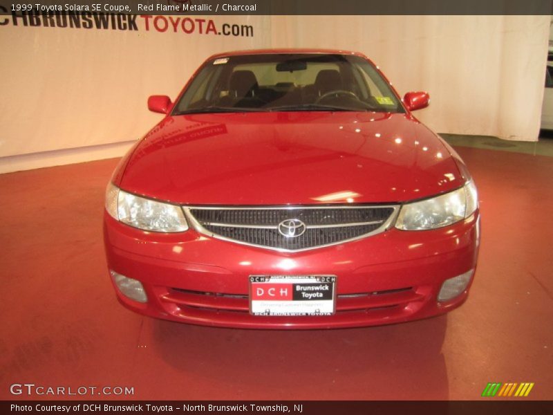 Red Flame Metallic / Charcoal 1999 Toyota Solara SE Coupe