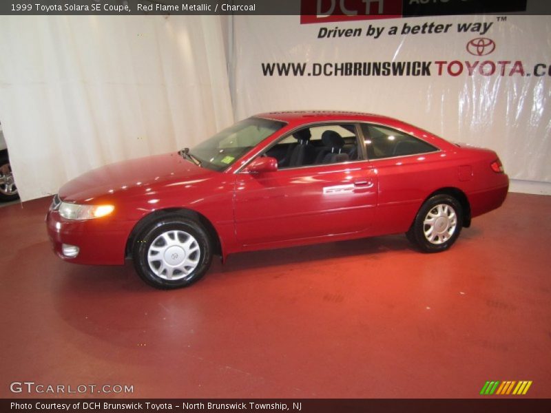 Red Flame Metallic / Charcoal 1999 Toyota Solara SE Coupe