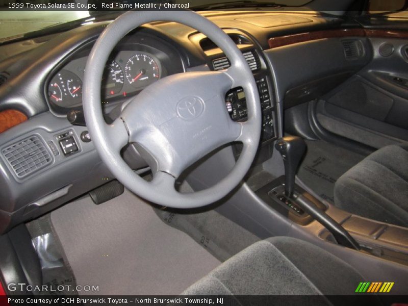 Red Flame Metallic / Charcoal 1999 Toyota Solara SE Coupe