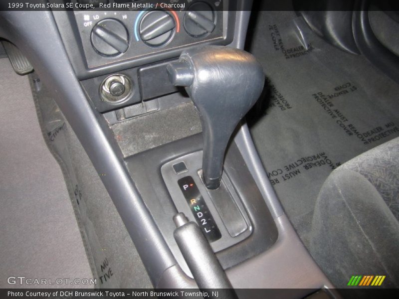 Red Flame Metallic / Charcoal 1999 Toyota Solara SE Coupe