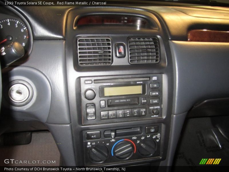 Red Flame Metallic / Charcoal 1999 Toyota Solara SE Coupe