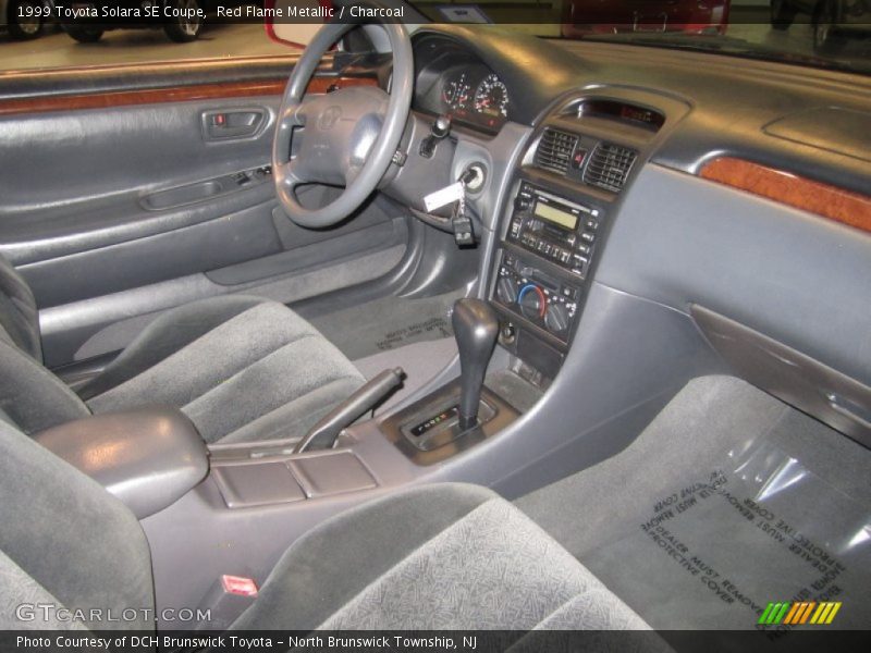 Red Flame Metallic / Charcoal 1999 Toyota Solara SE Coupe