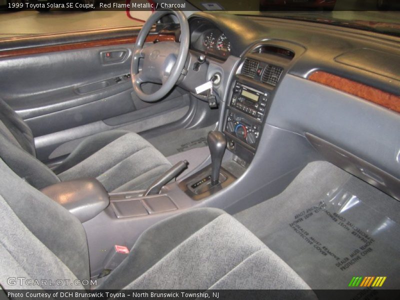 Red Flame Metallic / Charcoal 1999 Toyota Solara SE Coupe