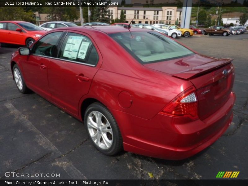 Red Candy Metallic / Medium Light Stone 2012 Ford Fusion SE