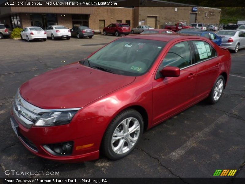 Red Candy Metallic / Medium Light Stone 2012 Ford Fusion SE
