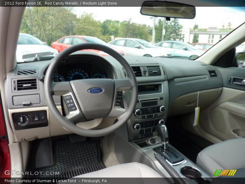 Red Candy Metallic / Medium Light Stone 2012 Ford Fusion SE