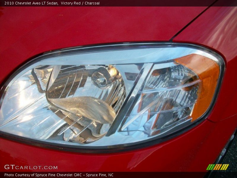 Victory Red / Charcoal 2010 Chevrolet Aveo LT Sedan