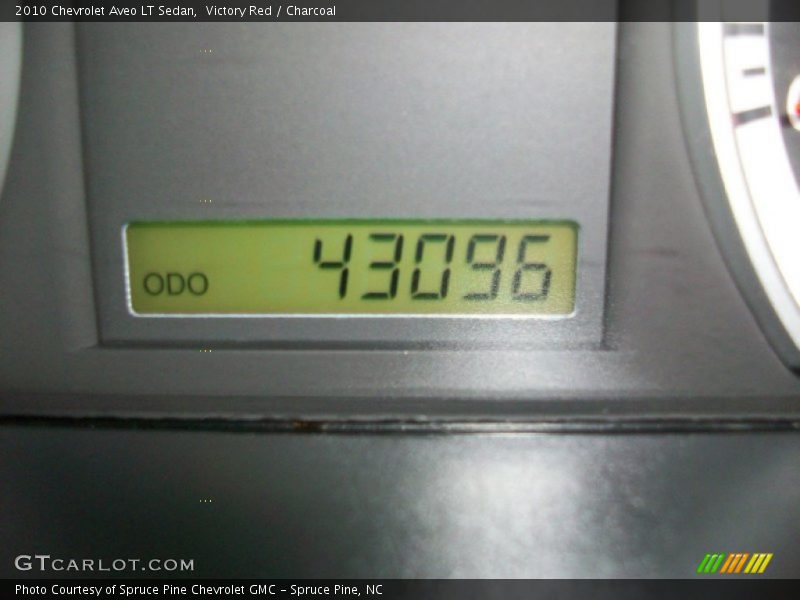 Victory Red / Charcoal 2010 Chevrolet Aveo LT Sedan