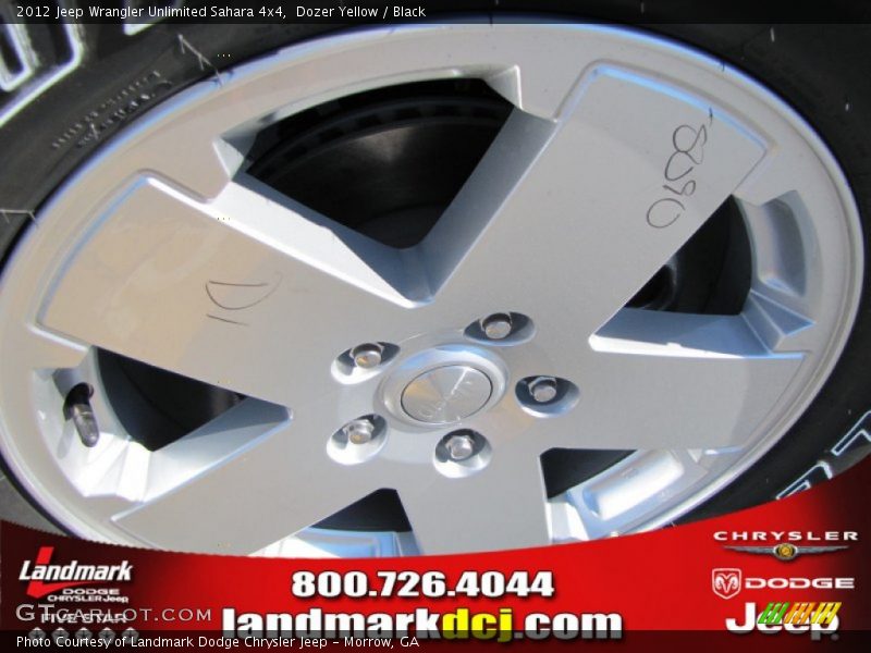Dozer Yellow / Black 2012 Jeep Wrangler Unlimited Sahara 4x4