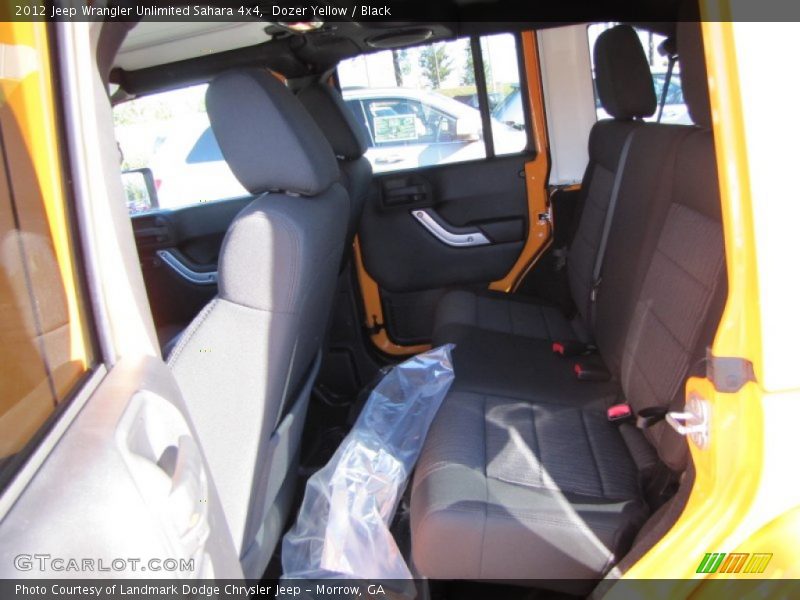 Dozer Yellow / Black 2012 Jeep Wrangler Unlimited Sahara 4x4