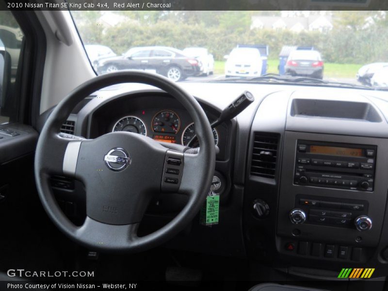 Red Alert / Charcoal 2010 Nissan Titan SE King Cab 4x4