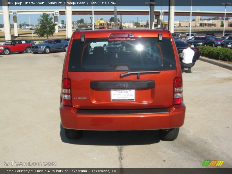 Sunburst Orange Pearl / Dark Slate Gray 2009 Jeep Liberty Sport