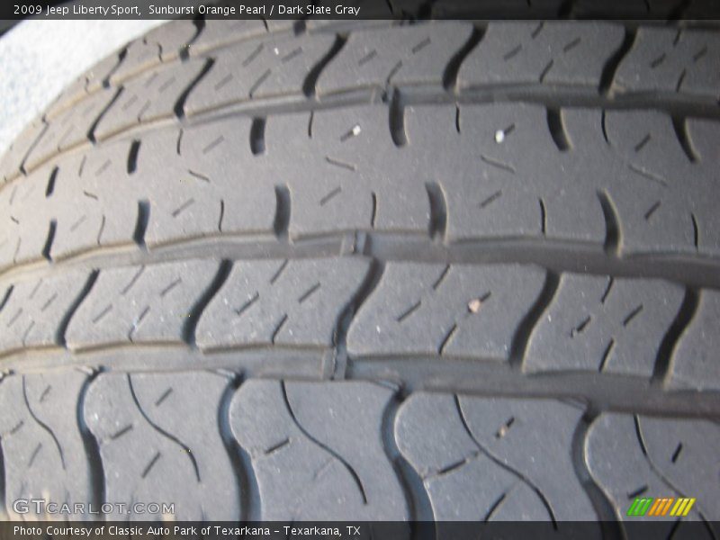 Sunburst Orange Pearl / Dark Slate Gray 2009 Jeep Liberty Sport