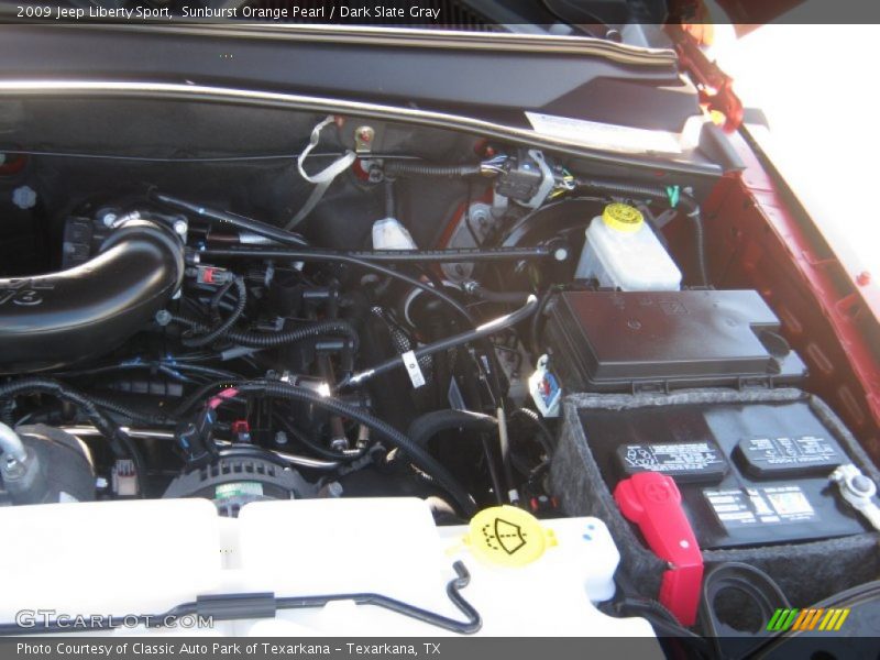 Sunburst Orange Pearl / Dark Slate Gray 2009 Jeep Liberty Sport