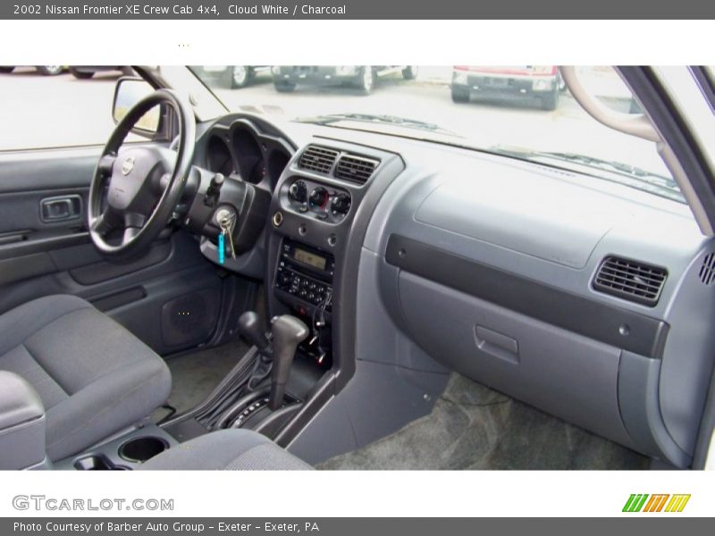 Dashboard of 2002 Frontier XE Crew Cab 4x4