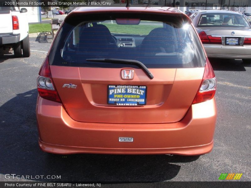 Blaze Orange Metallic / Black/Grey 2008 Honda Fit Sport