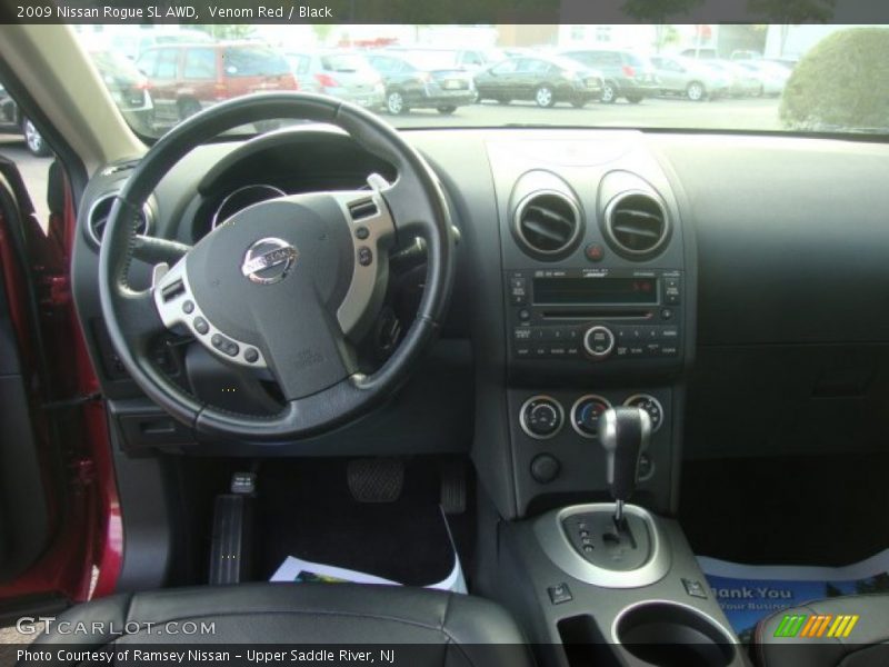 Venom Red / Black 2009 Nissan Rogue SL AWD