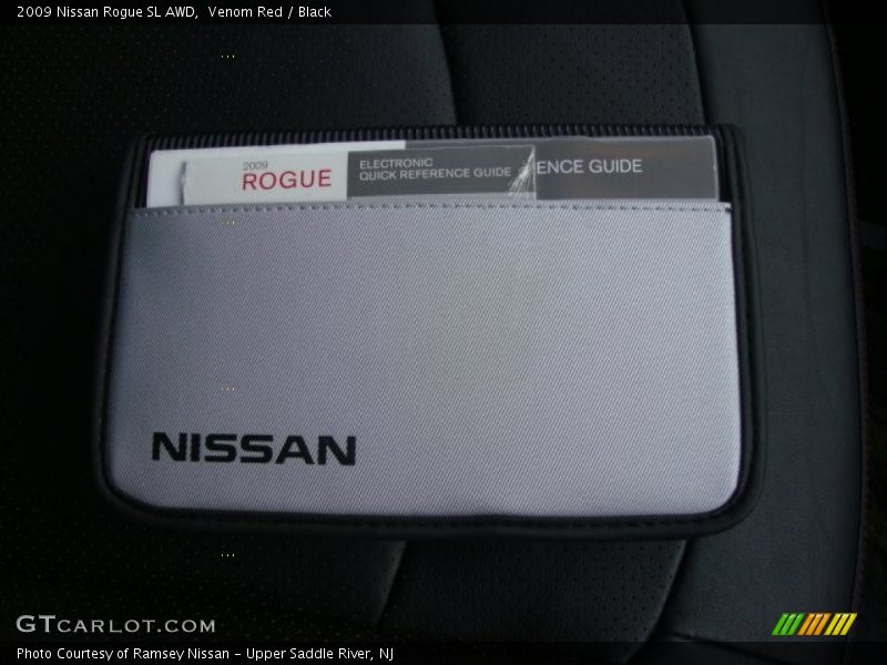 Venom Red / Black 2009 Nissan Rogue SL AWD