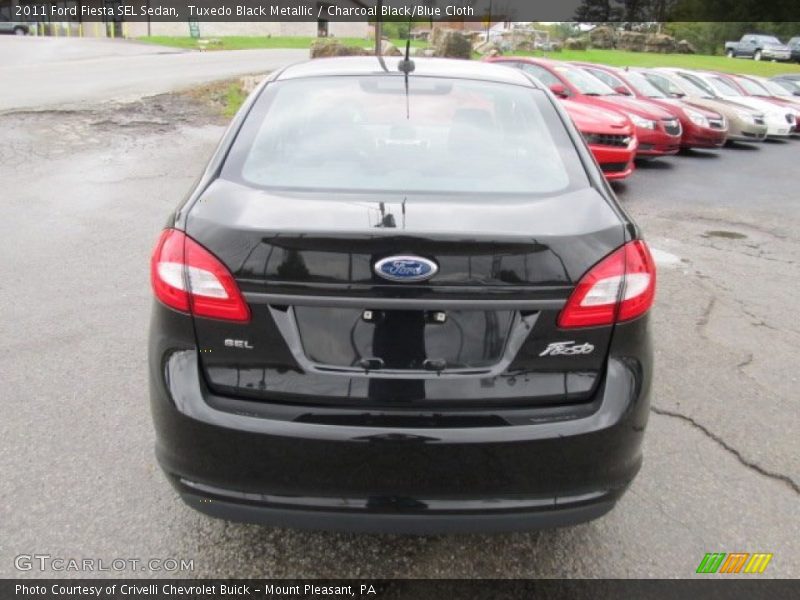 Tuxedo Black Metallic / Charcoal Black/Blue Cloth 2011 Ford Fiesta SEL Sedan