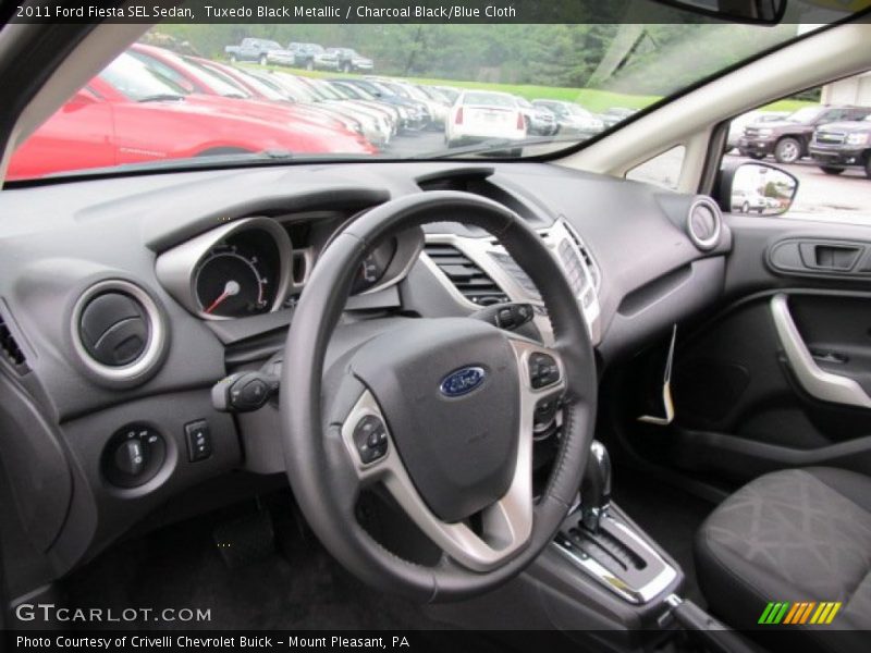 Tuxedo Black Metallic / Charcoal Black/Blue Cloth 2011 Ford Fiesta SEL Sedan
