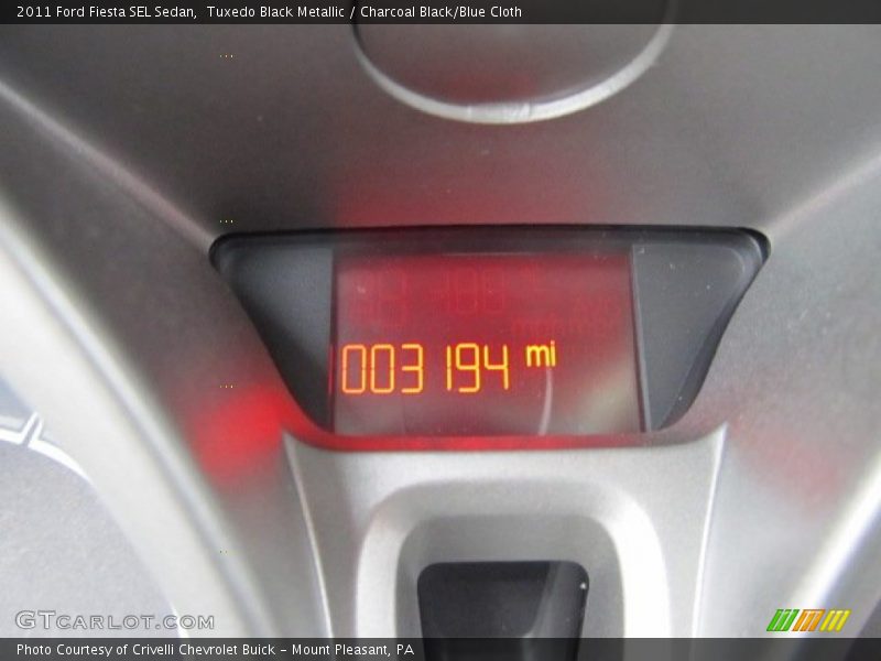 Tuxedo Black Metallic / Charcoal Black/Blue Cloth 2011 Ford Fiesta SEL Sedan