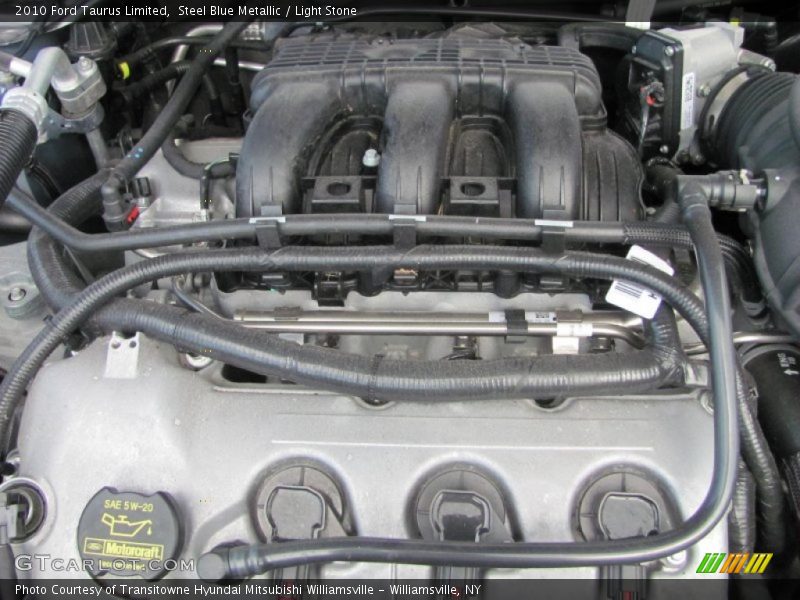 Steel Blue Metallic / Light Stone 2010 Ford Taurus Limited