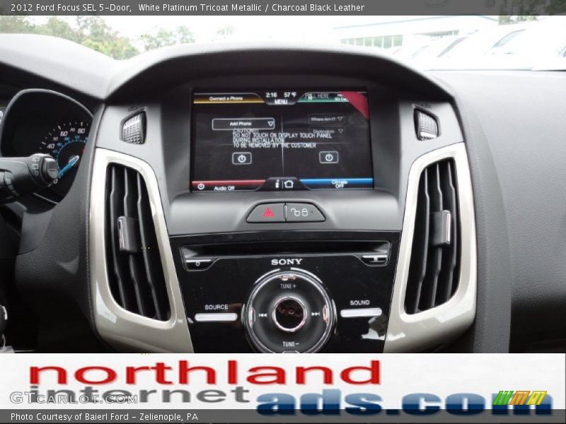 White Platinum Tricoat Metallic / Charcoal Black Leather 2012 Ford Focus SEL 5-Door