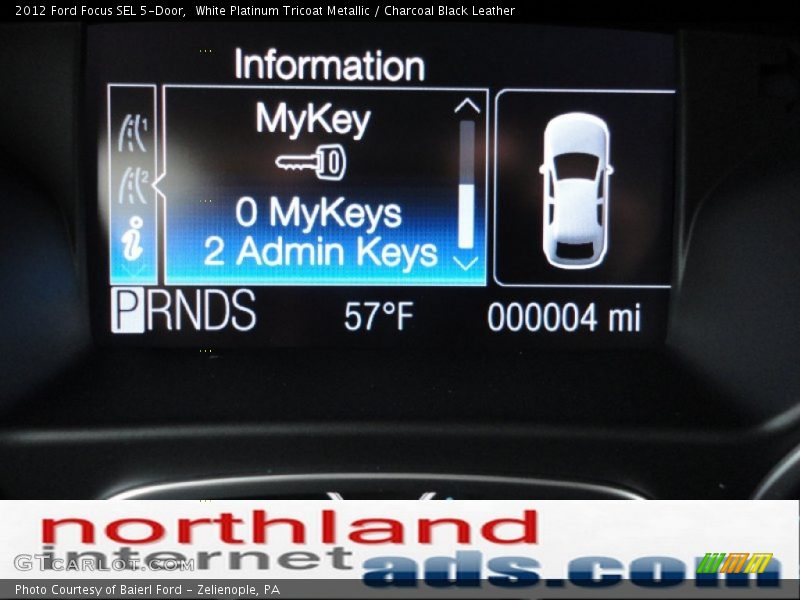 White Platinum Tricoat Metallic / Charcoal Black Leather 2012 Ford Focus SEL 5-Door